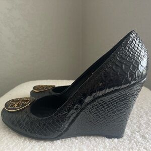 Tory Burch Black Patent Snake-Embossed Wedge Pumps with Gold Logo